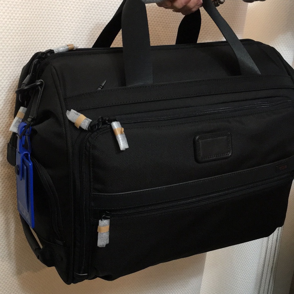 Tumi soft duffel black carry on suitcase